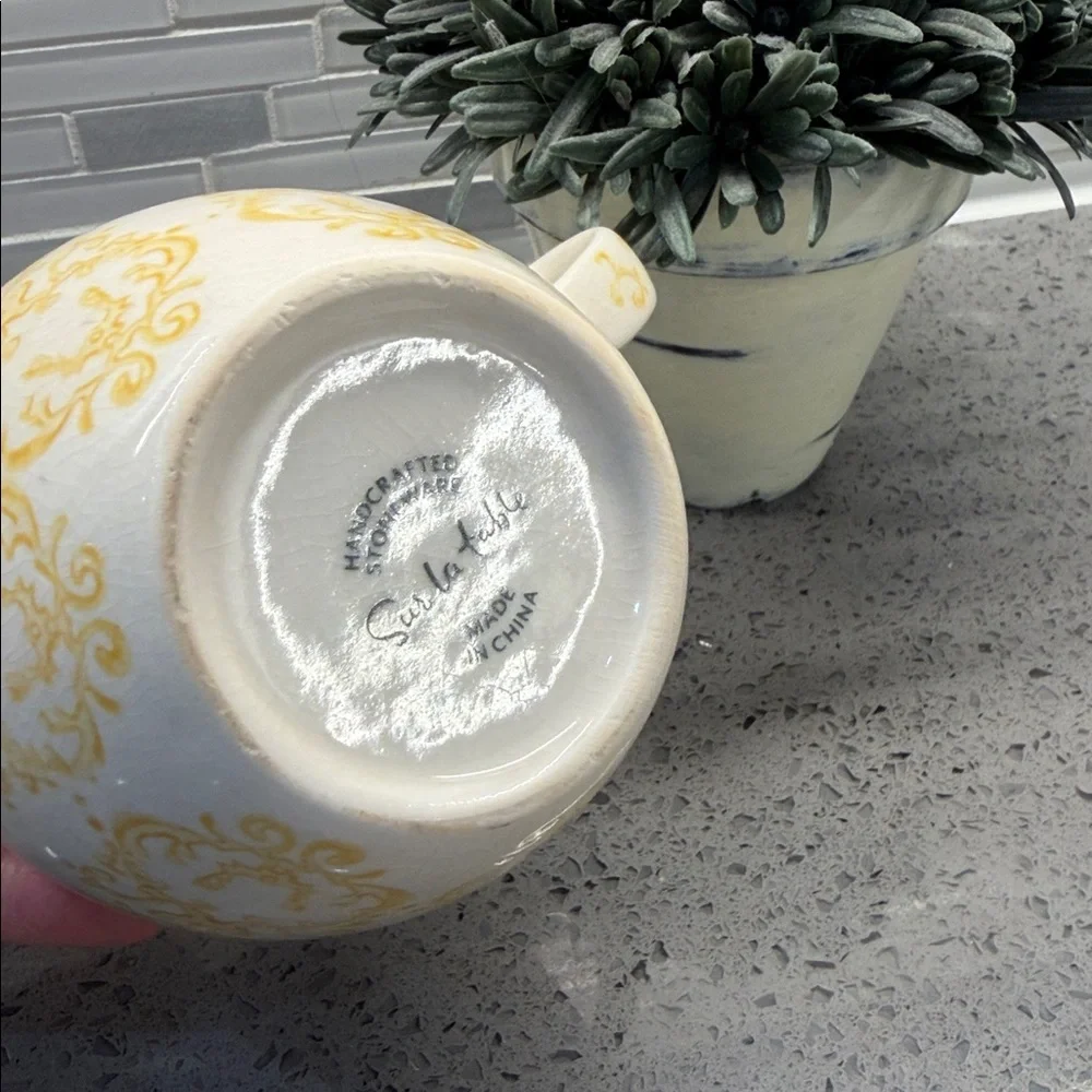 Sur la Table White Ceramic Mug with Yellow Filigree Pattern